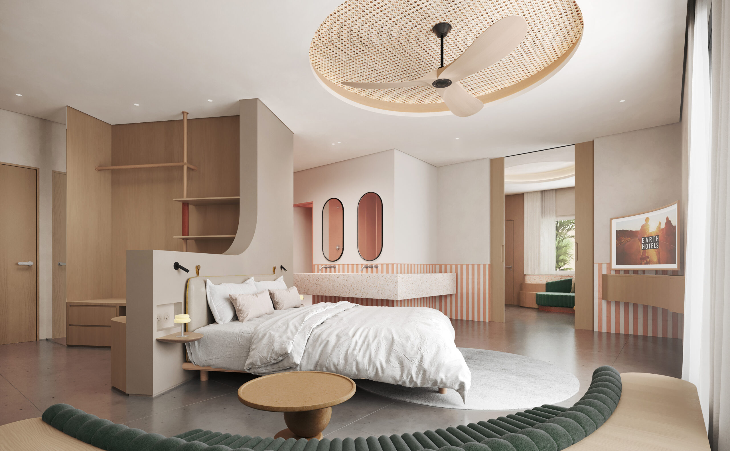 Suite bedroom with a curved green sofa and warm wood tones