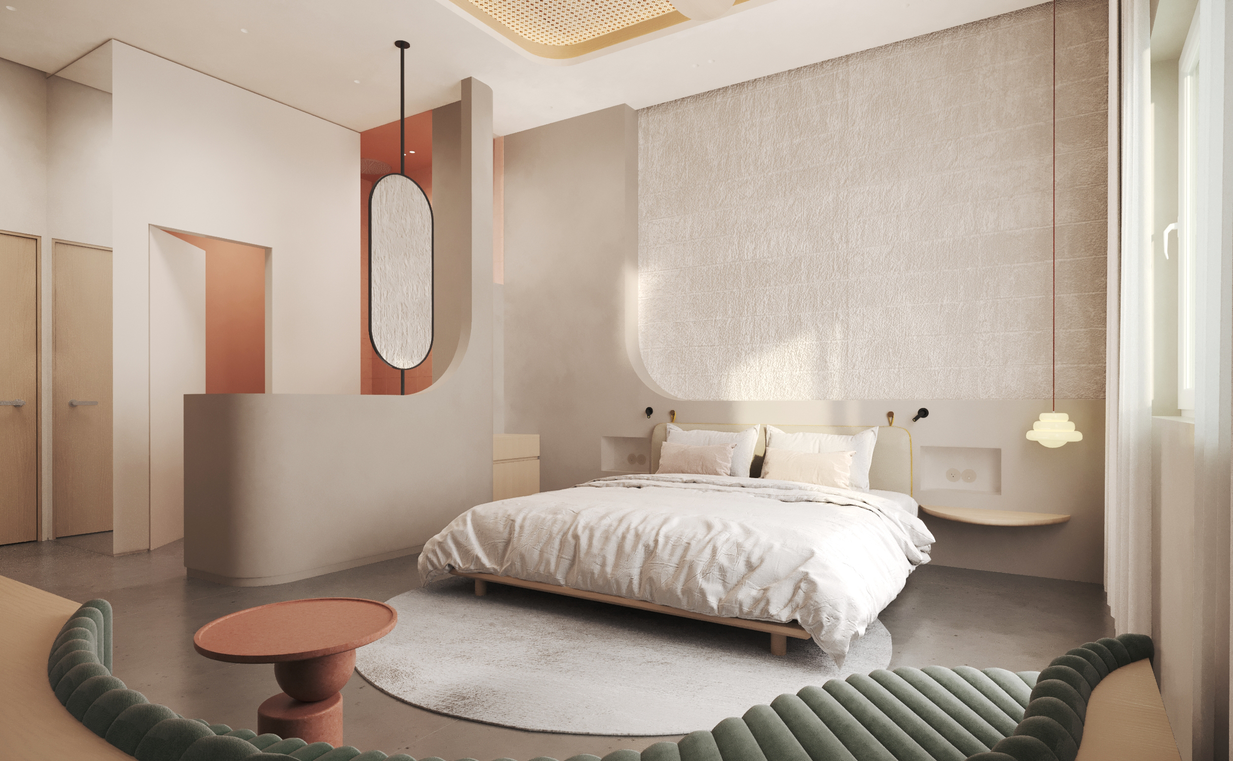 Guest room with a large bed, soft neutral tones and a round side table